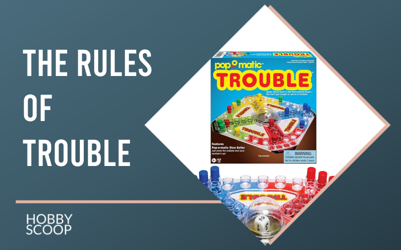 Trouble board game setup showing the Pop-O-Matic dice roller and colored pegs